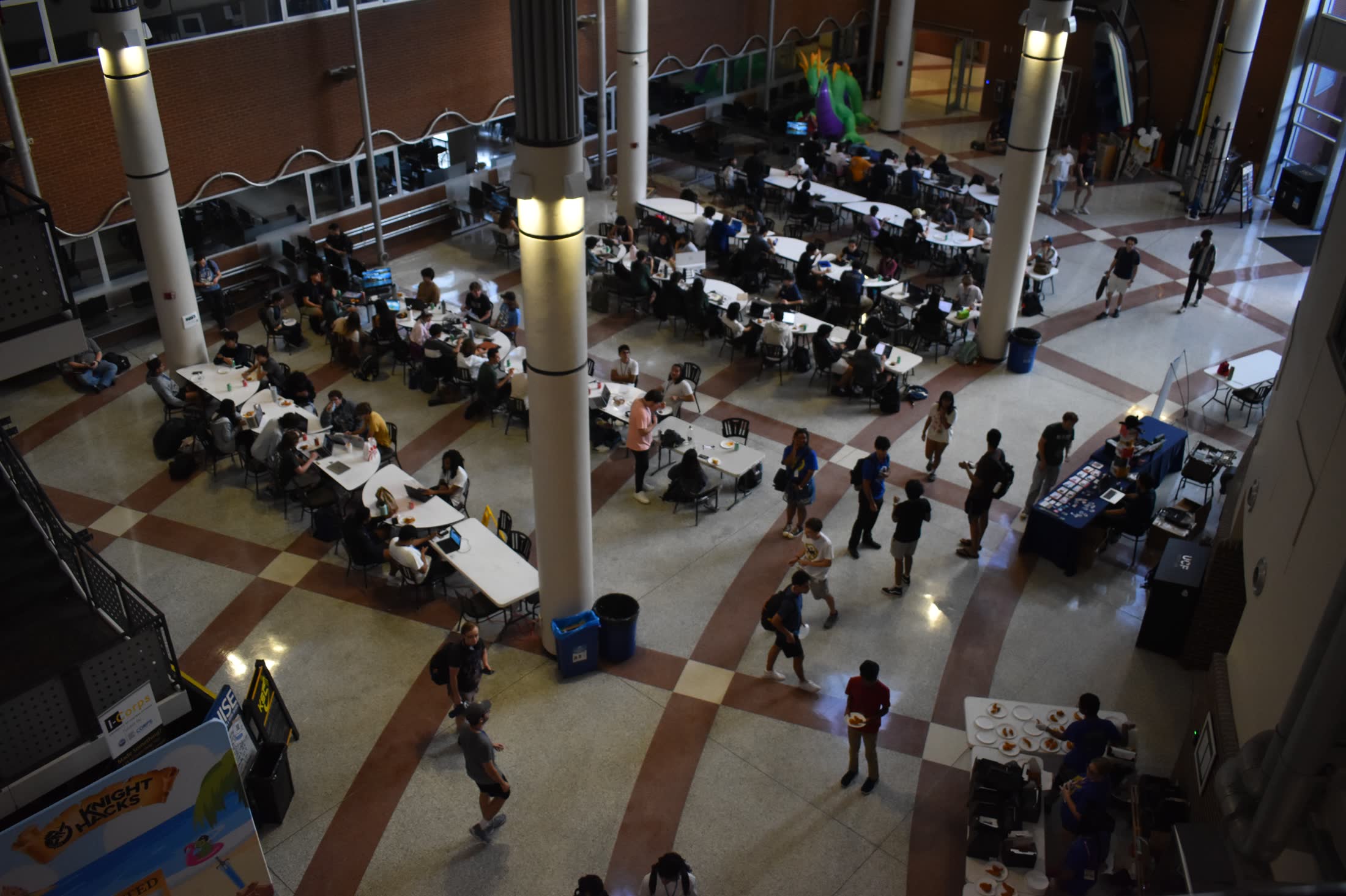 Knight Hacks hackathon attendees gathered in a large room
